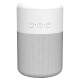 Enceinte avec grille textile et commandes frontales.