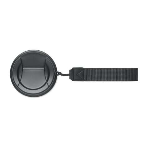 Vue de dessus du couvercle rond noir avec dragonne fixée sur le côté.