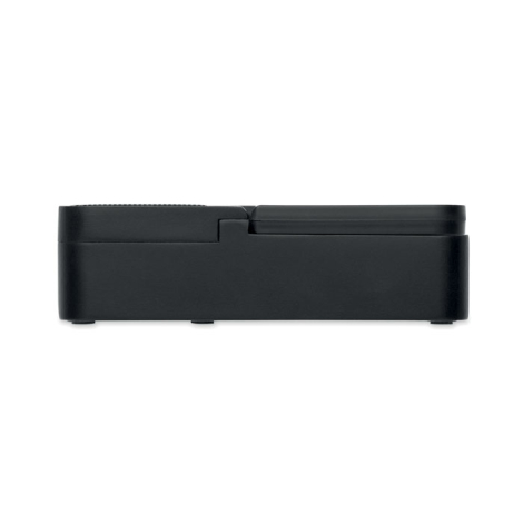 Vue latérale du haut-parleur noir avec support pour smartphone rabattu à plat sur le dessus.