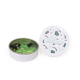 Petite boîte métallique ronde blanche contenant des graines de pois de cœur, accompagnée de son couvercle personnalisé AVECsanté Petite boîte métallique ronde blanche contenant des graines de pois de cœur, accompagnée de son couvercle personnalisé AVECsanté