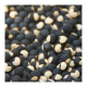 Gros plan sur un ensemble de graines de pois de cœur, reconnaissables à leur forme ronde noire ornée d'une tache blanche en form Gros plan sur un ensemble de graines de pois de cœur, reconnaissables à leur forme ronde noire ornée d'une tache blanche en form