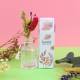 Coffret publicitaire en papier ensemencé personnalisé Institut Perle Noire, ouvert et garni d'un petit bouquet de fleurs séchées Coffret publicitaire en papier ensemencé personnalisé Institut Perle Noire, ouvert et garni d'un petit bouquet de fleurs séchées