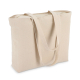 Vue latérale d’un tote bag à longues anses en toile naturelle, sans marquage visible