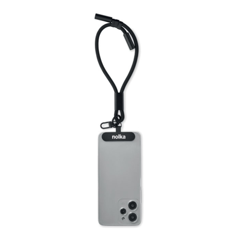 Bracelet de chargement noir fixé à un smartphone, marquage sur la plaque rectangulaire.