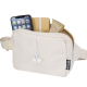 Sac bandoulière beige ouvert laissant apparaître un téléphone, un carnet et un encas à l’intérieur.