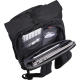 Sac à dos noir ouvert, montrant l’intérieur avec ordinateur portable, tablette et accessoires électroniques.