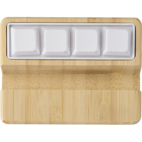 Vue du dessus montrant les quatre touches blanches intégrées dans le support en bambou, aucune personnalisation visible.