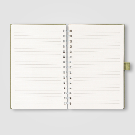 Vue intérieure du carnet montrant la spirale et les pages lignées. Vue intérieure du carnet montrant la spirale et les pages lignées.