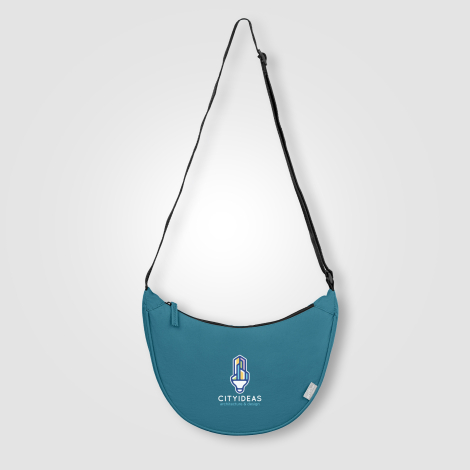 Sac bandoulière bleu vu de face avec marquage quadri visible. Sac bandoulière bleu vu de face avec marquage quadri visible.