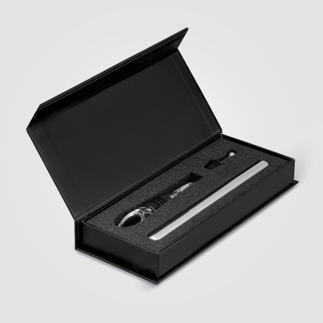 Coffret ouvert dévoilant la tige refroidissante et le verseur en position Coffret ouvert dévoilant la tige refroidissante et le verseur en position