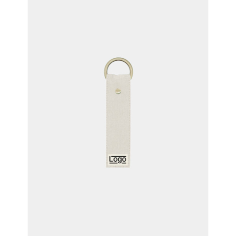 Porte-clés écru uni avec anneau doré et rivet central, marquage en bas