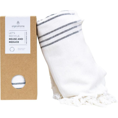 Fouta blanche roulée accompagnée de son coffret cadeau cartonné avec ouverture circulaire laissant entrevoir le textile ; sans m