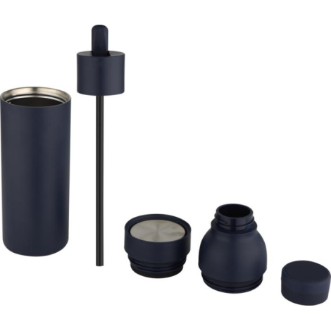 Coffret en carton recyclé ouvert avec bouteille et accessoires dans leur calage, sans marquage visible ; vue éclatée de la boute