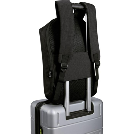 Vue arrière du sac fixé sur la poignée d’une valise, bretelles rembourrées et panneau dorsal respirant bien visibles ; aucune pe