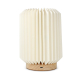 Lampe LED en papier pliable sur socle bois clair, vue arrière avec port de recharge intégré.