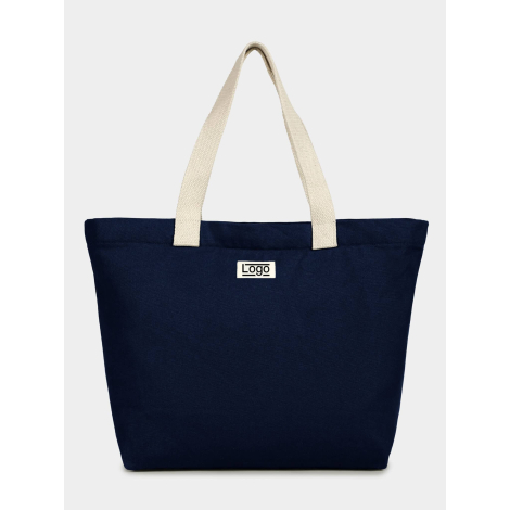 Sac cabas bleu foncé présenté de face avec anses claires et étiquette centrale personnalisée.