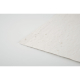Gros plan sur le coin d’une feuille de papier à planter montrant l’épaisseur et la texture du matériau, sans personnalisation vi