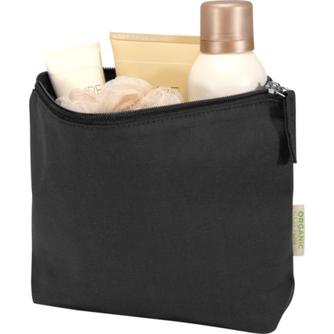Trousse noire présentée de face partiellement ouverte avec produits de toilette visibles à l’intérieur, sans marquage apparent e