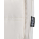 Vue rapprochée du côté d’une trousse de toilette beige avec étiquette latérale, sans marquage visible.