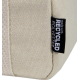 Détail de l’angle inférieur d’un sac déjeuner beige montrant la texture de la toile et une petite étiquette latérale cousue, san Détail de l’angle inférieur d’un sac déjeuner beige montrant la texture de la toile et une petite étiquette latérale cousue, san