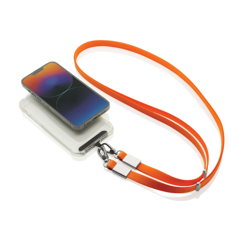 Lanière orange fixée à un smartphone posé à plat, sur fond clair, sans personnalisation visible.