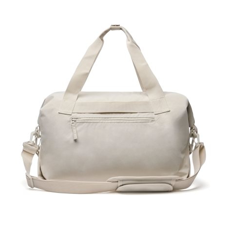 Sac de voyage beige présenté de dos avec poche zippée visible, sur fond neutre, sans marquage apparent.