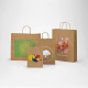 Ensemble de sacs en papier kraft marron avec différents marquages visibles sur la face avant