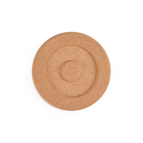 Vue de dessus du dessous de plat en liège avec anneaux concentriques, sans personnalisation visible