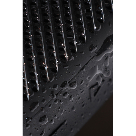 Gros plan sur surface texturée avec gouttes d’eau sans personnalisation visible