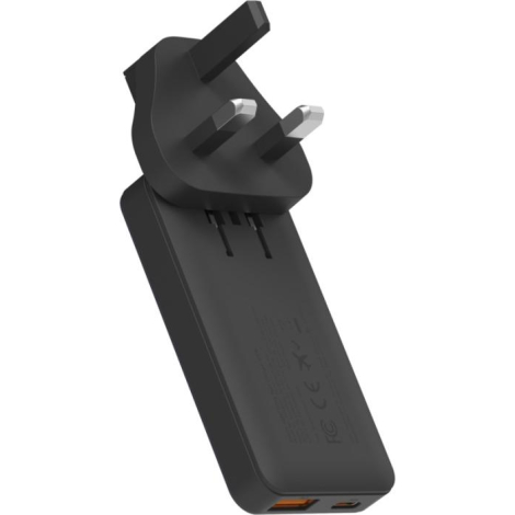 Adaptateur secteur fixé sur le chargeur, présenté en vue inclinée, sans marquage visible.