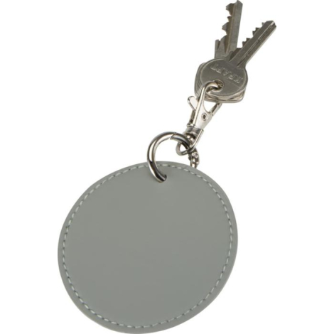 Porte-clés rond gris attaché à un trousseau de clés, sans personnalisation apparente.