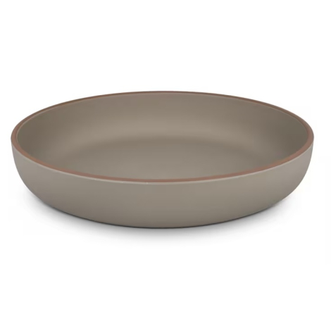Vue latérale d’une assiette creuse beige avec bord contrasté, sans personnalisation visible sur la face extérieure