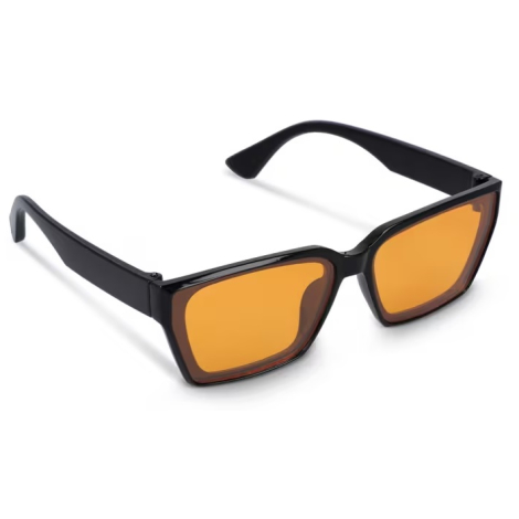 Vue rapprochée d’une monture noire avec verre teinté orange, présentée sans marquage visible.