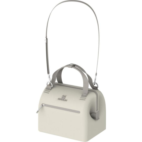Mini-sac isotherme beige présenté avec sa bandoulière amovible fixée, sans personnalisation apparente.