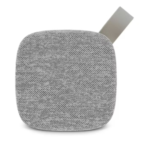 Face avant d'une enceinte Bluetooth en bambou recouverte d'un tissu acoustique gris.