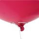 Gros plan sur la partie inférieure d’un ballon gonflable rouge équipé d’une tige métallique de maintien, sans marquage visible. Gros plan sur la partie inférieure d’un ballon gonflable rouge équipé d’une tige métallique de maintien, sans marquage visible.
